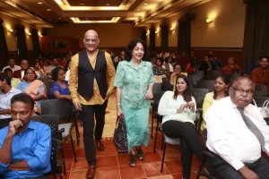 Armando escorting MLA Alina Saldanha who was there to receive the award posthumously on behalf of her late husband Matanhy Saldanha