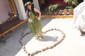 Daisy Moreno getting ready for the fancy dress contest under the caption _Coconut Love_