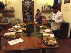 Judges tasting various Thalis