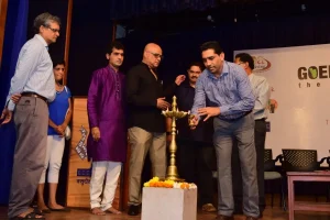 Social activist Shri Govind Gaude (now Minister for Art and Culture, Goa Government) is seen lighting the traditional lamp_