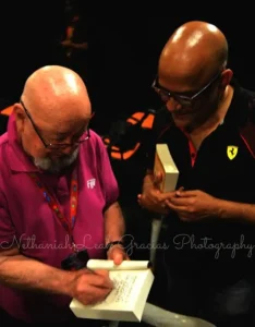Thomas Keneally autographing his award winning book, the Schindler_s List, for Armando Gonsalves. It will be a treasure always!