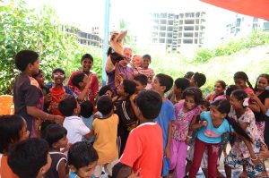 puppeteer Ken amusing the kids with his bird puppet