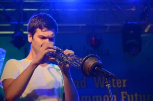 An unique wind instrument being played by a foreign musician