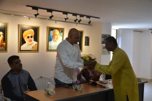 Armando Gonsalves being felicitated